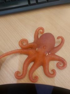 A rubber octopus on a table